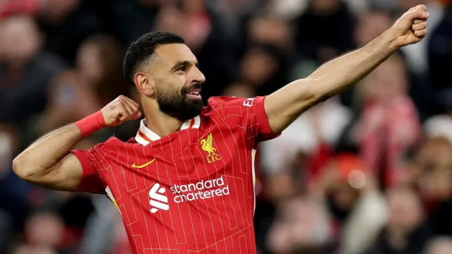 Foto: Mohamed Salah melakukan selebrasi usai mencetak gol untuk Liverpool